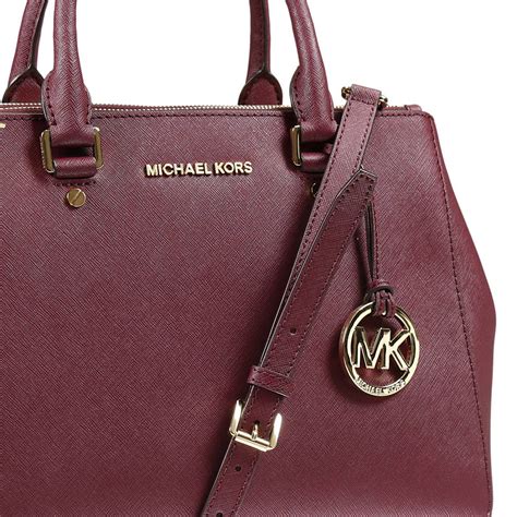 pictures of older dark purple michael kors purses|women's purple Michael Kors purse.